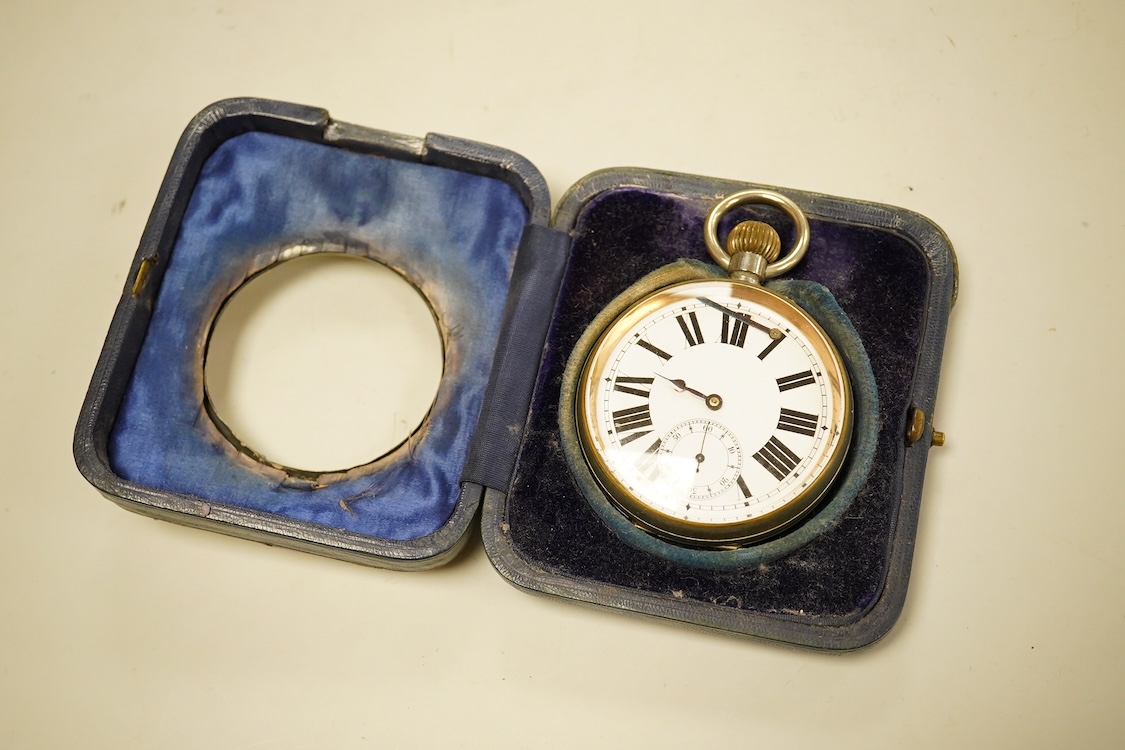 An Edwardian hammered silver mounted travelling pocket watch case, Wilson & Gill, Birmingham, 1903, containing a nickel cased pocket watch.